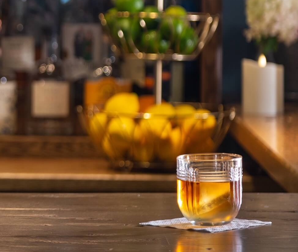 glass of whisky on a bar